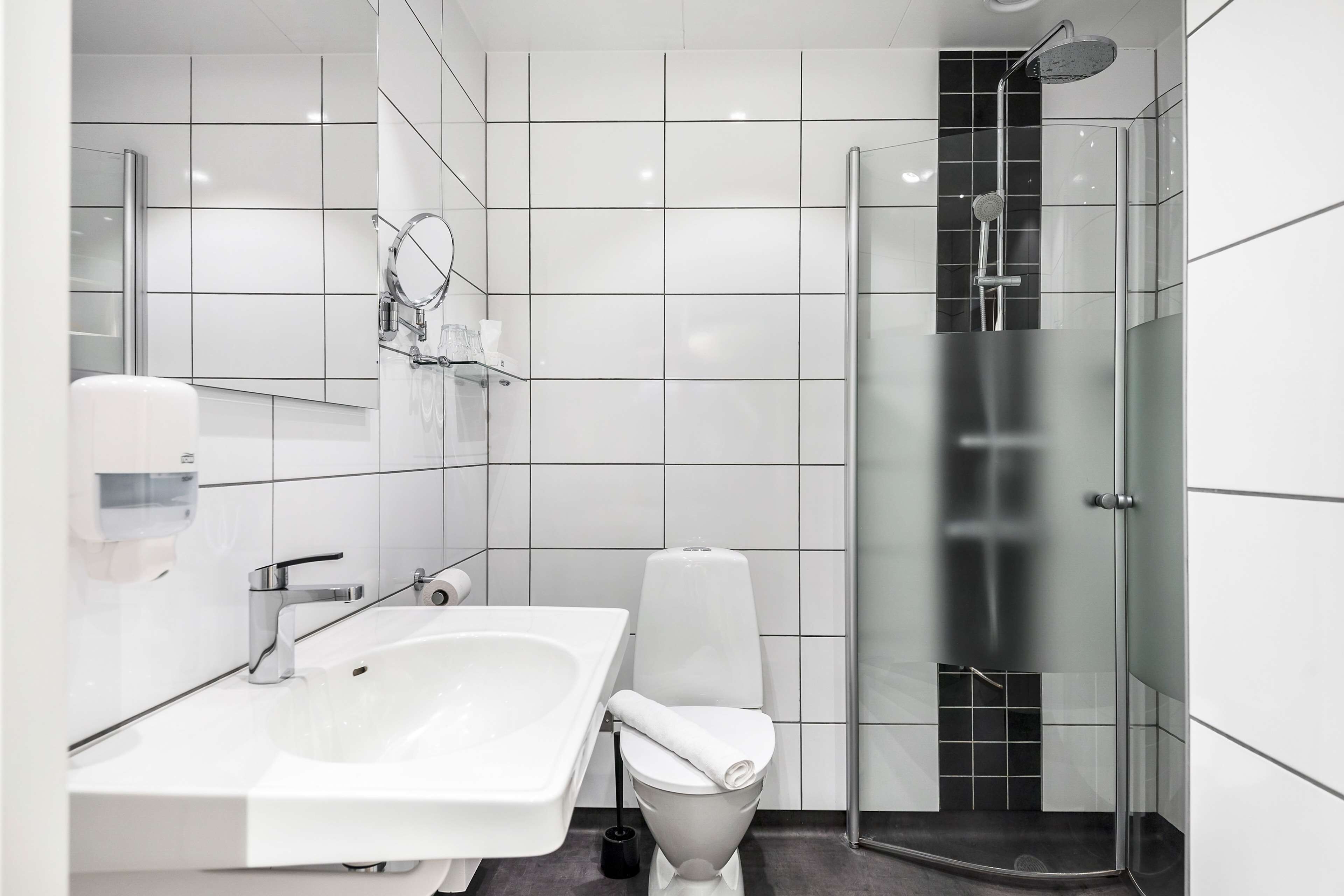 family room, 2 single beds, non smoking | bathroom | hair dryer, towels