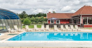 Outdoor pool, open 10:00 AM to 9:00 PM, pool umbrellas, pool loungers