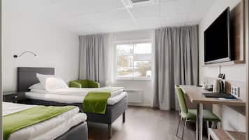 Minibar, desk, laptop workspace, blackout curtains