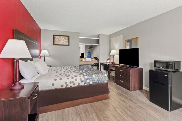 Desk, blackout drapes, iron/ironing board, rollaway beds