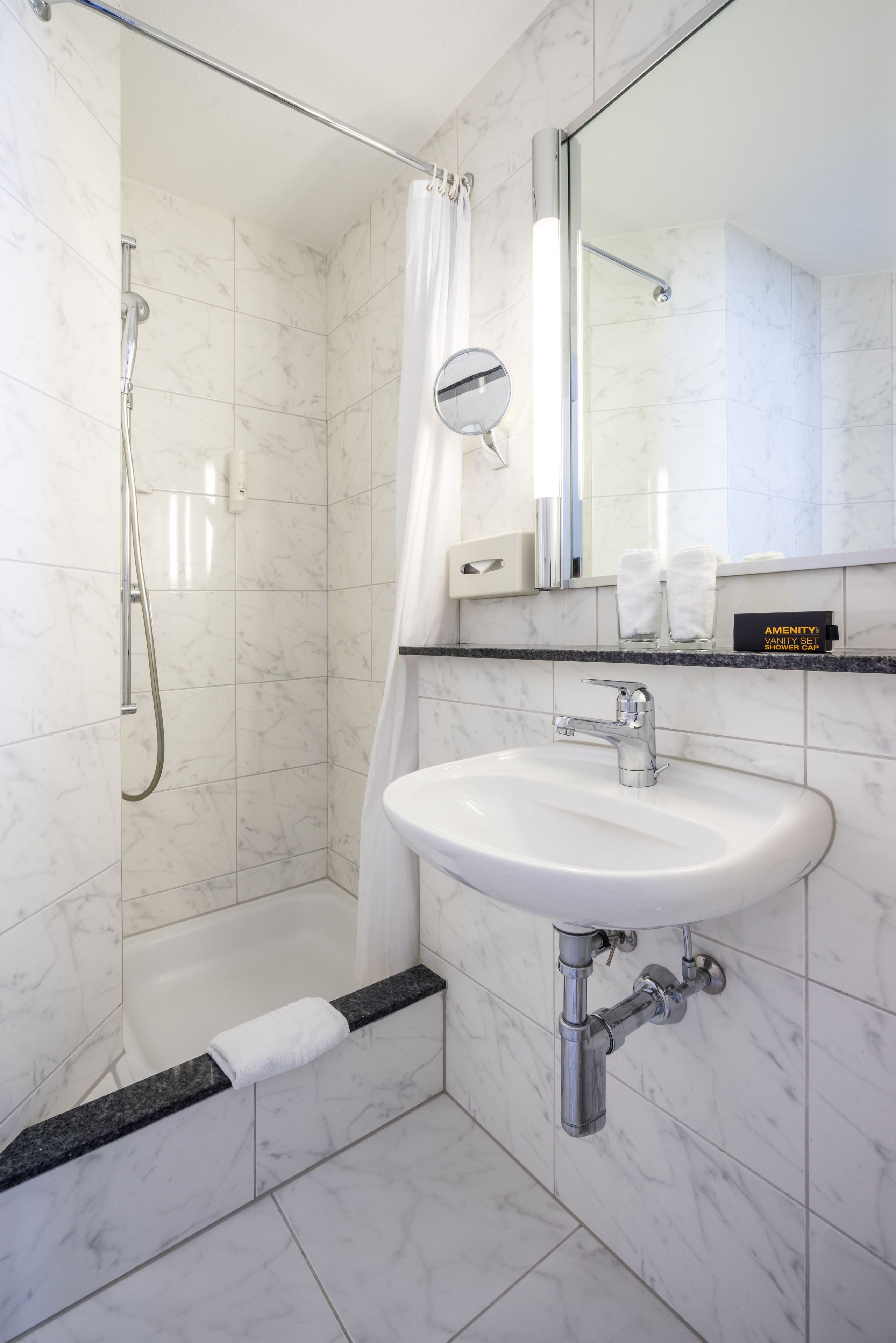 standard twin room | bathroom | free toiletries, hair dryer, towels, soap