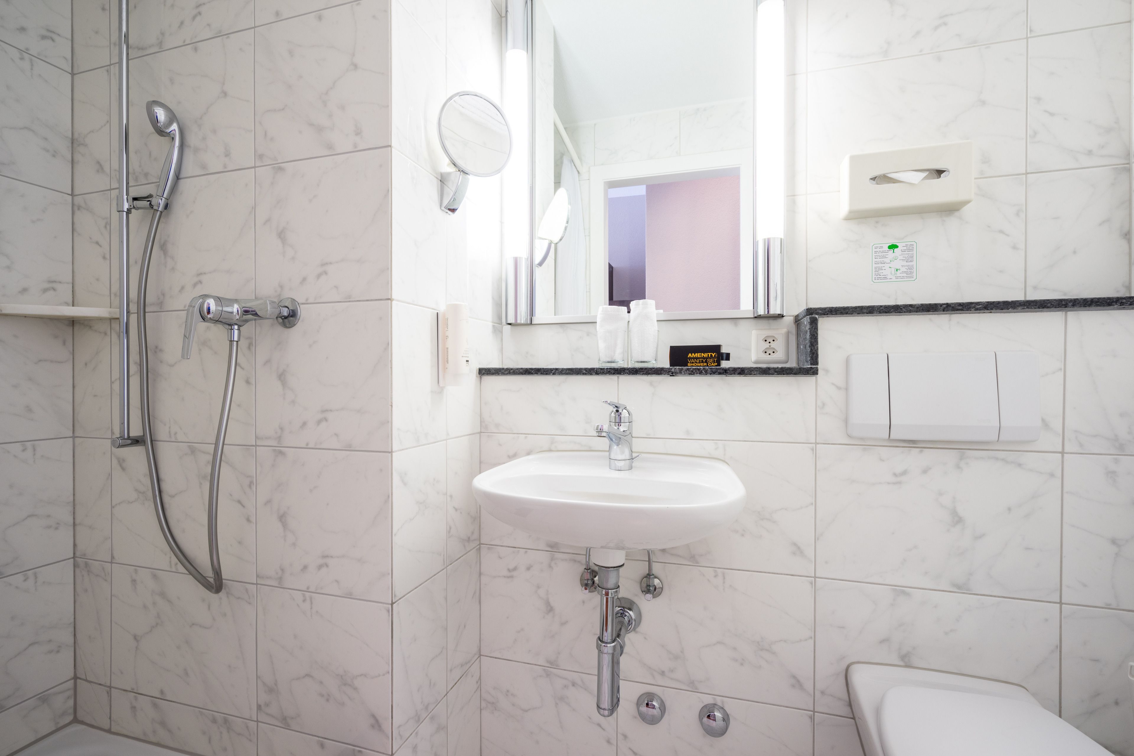 standard twin room | bathroom | free toiletries, hair dryer, towels, soap