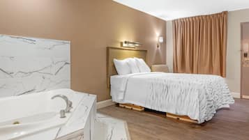 Habitación Deluxe, 1 cama de matrimonio, no fumadores, bañera de hidromasaje | Caja fuerte, escritorio, espacio para trabajar con un portátil