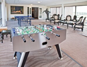 32-inch TV with cable channels, table football, ping pong