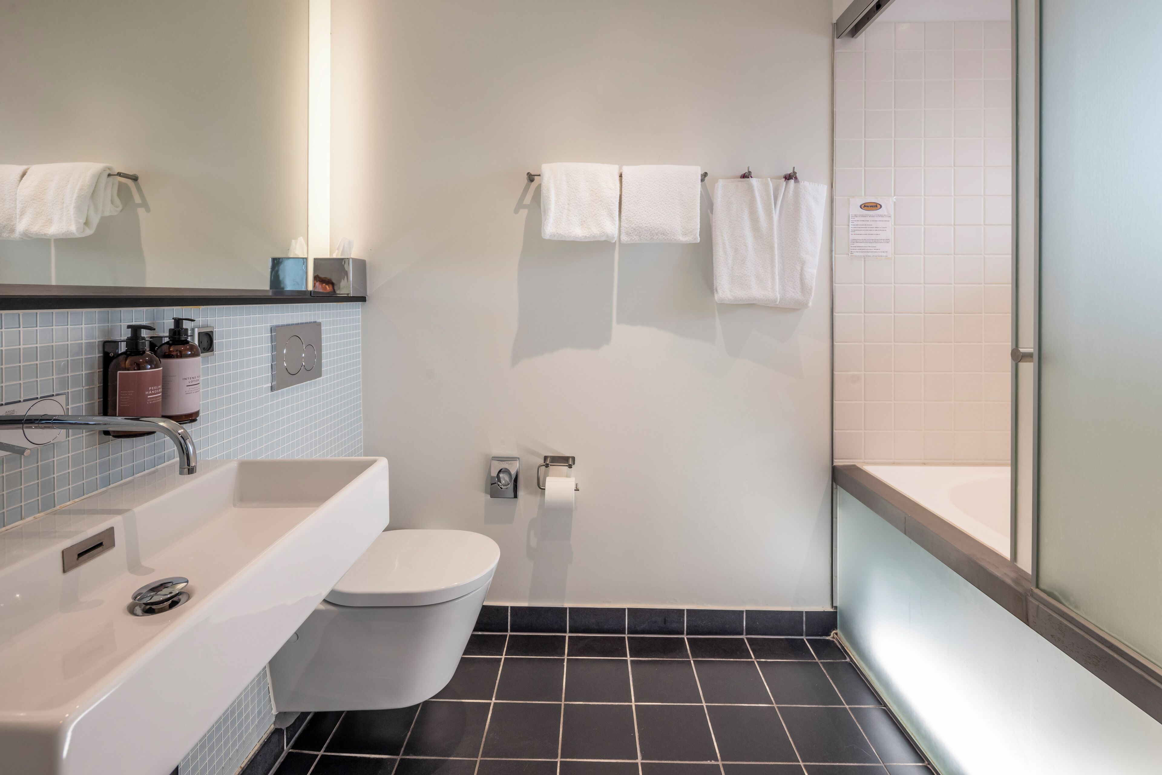 superior plus. | bathroom | shower, hair dryer, towels, soap