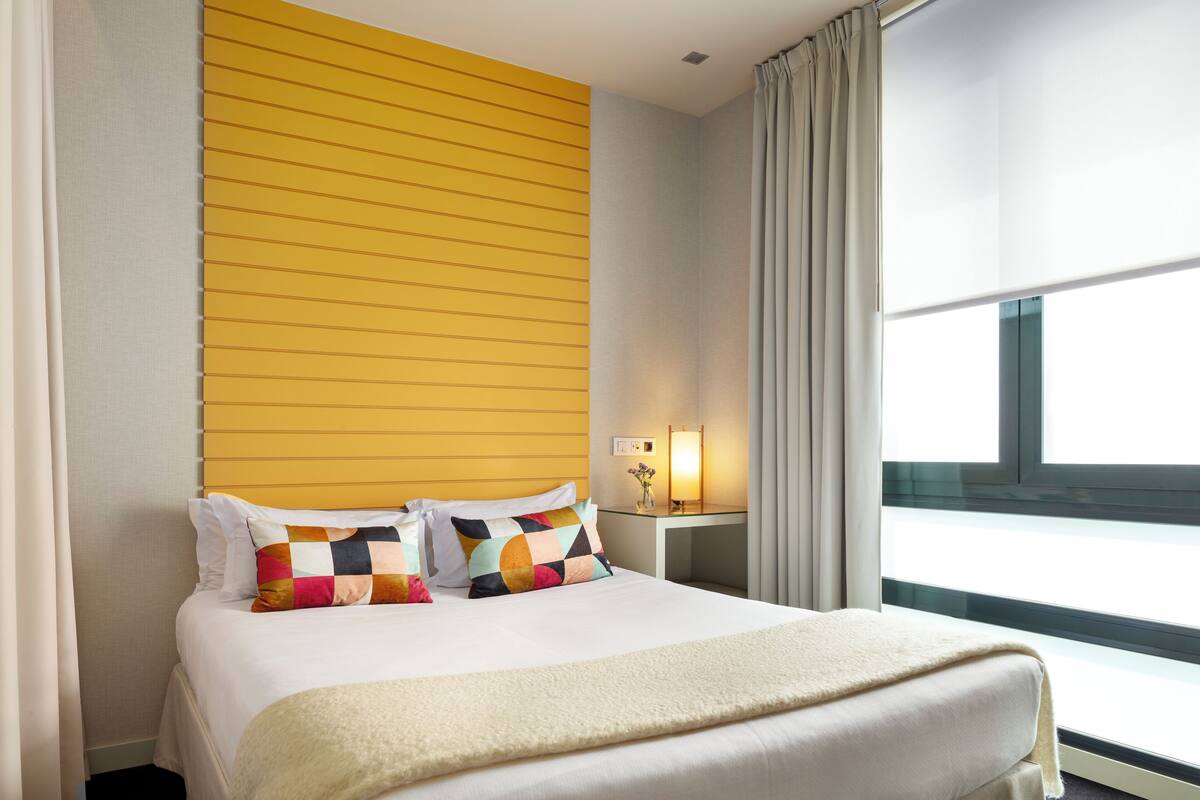 Egyptian cotton sheets, down duvets, memory-foam beds, minibar