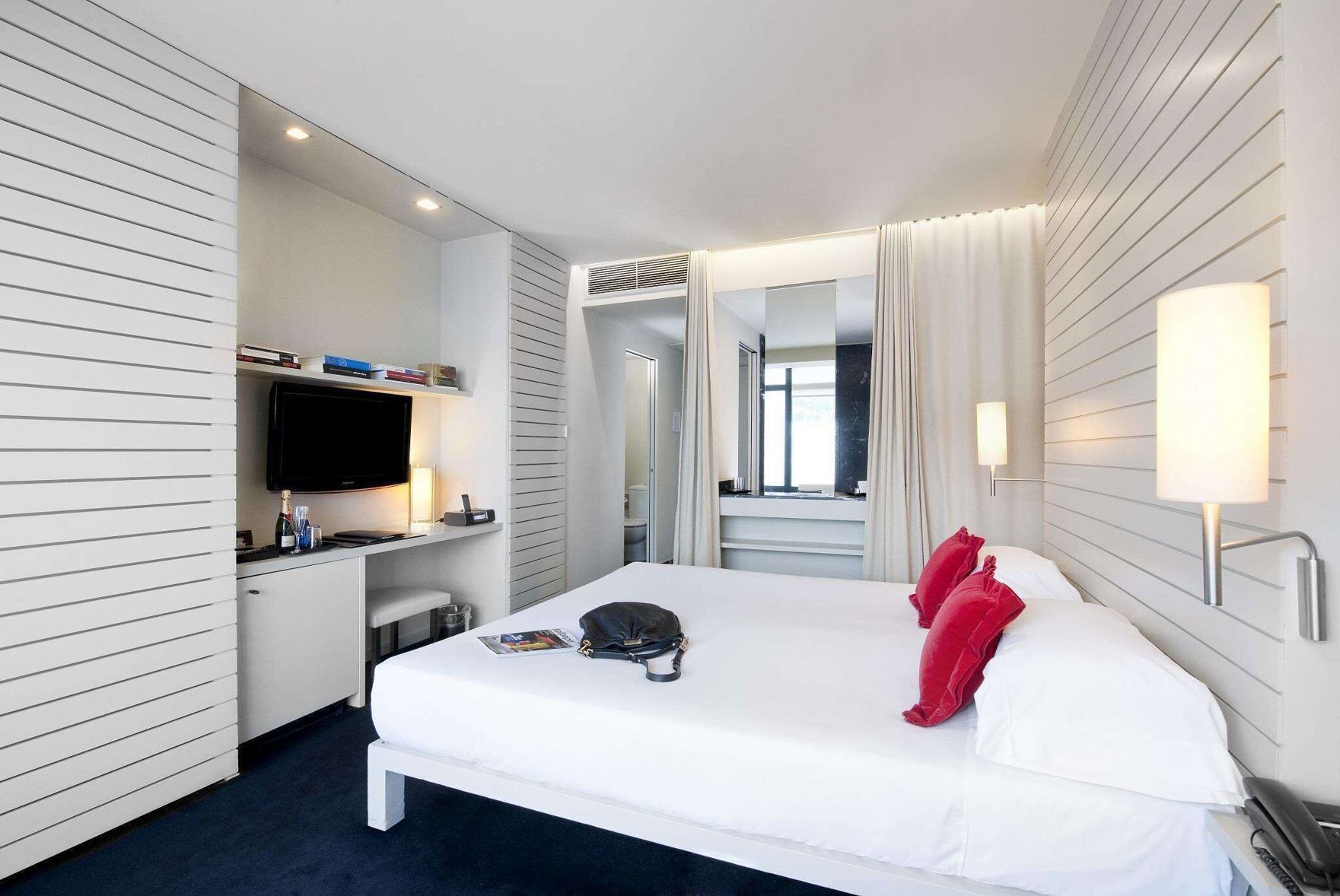 Egyptian cotton sheets, down comforters, memory foam beds, minibar