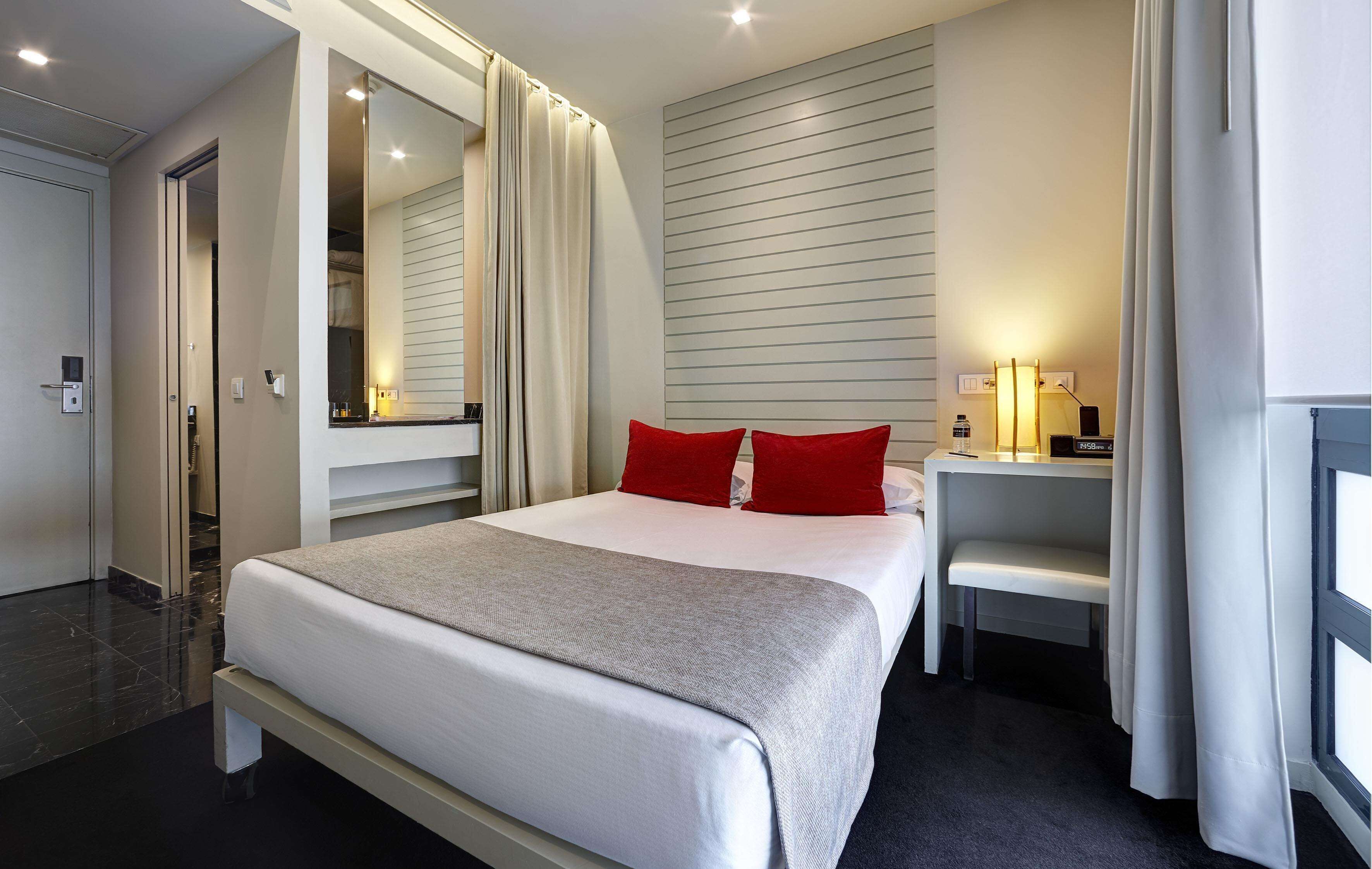 Egyptian cotton sheets, down comforters, memory foam beds, minibar