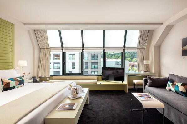 Egyptian cotton sheets, down duvets, memory-foam beds, minibar