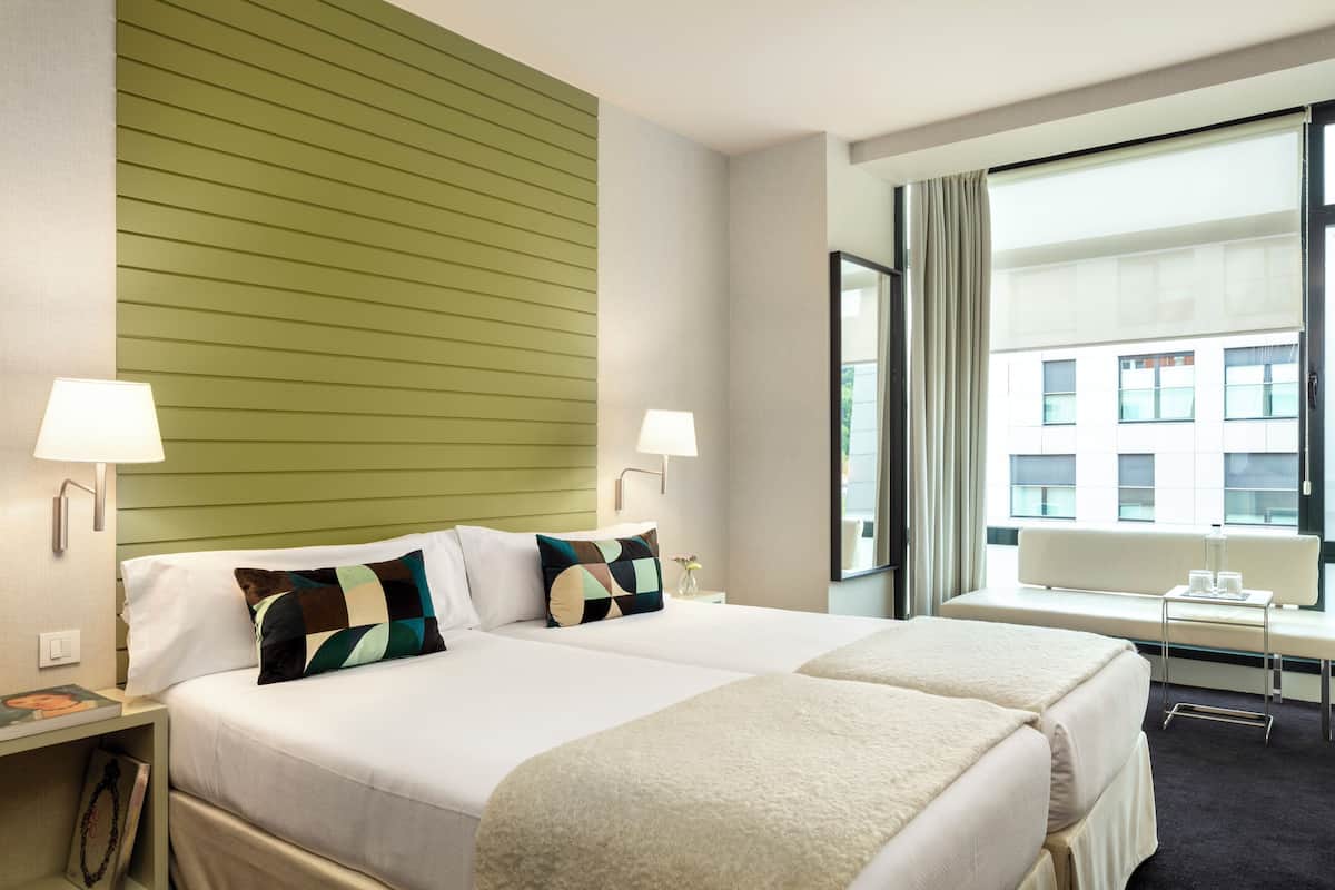 Egyptian cotton sheets, down duvets, memory-foam beds, minibar