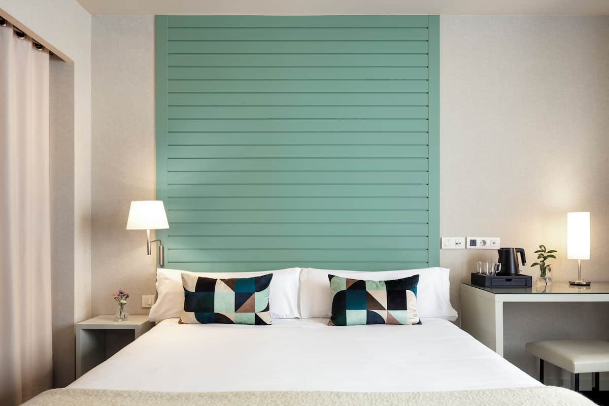 Egyptian cotton sheets, down duvets, memory-foam beds, minibar
