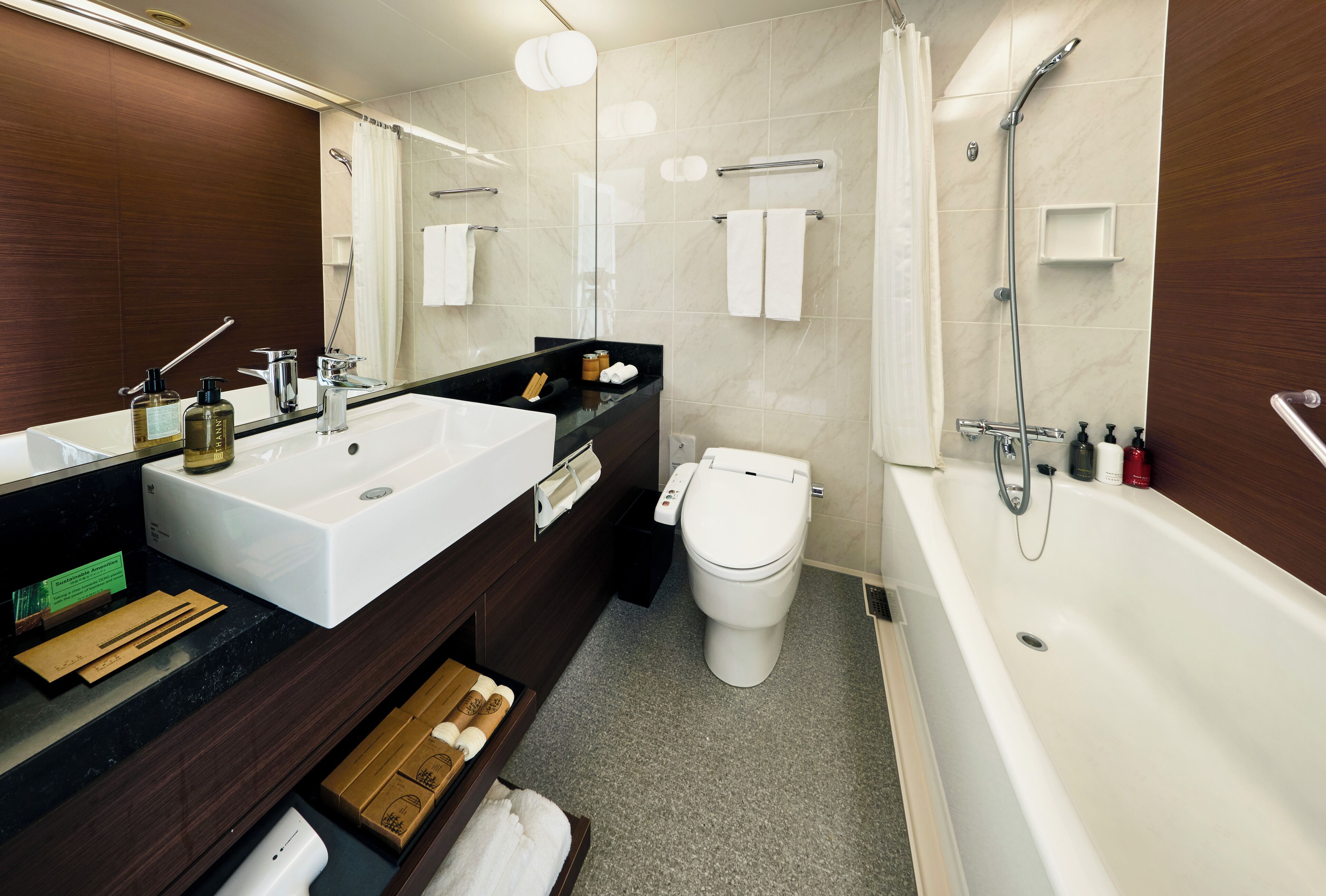 combined shower/bathtub, deep-soaking bathtub, designer toiletries