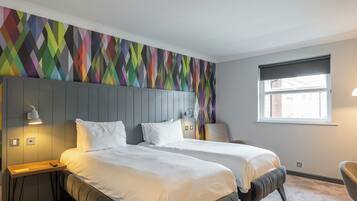 Desk, laptop workspace, blackout drapes, iron/ironing board