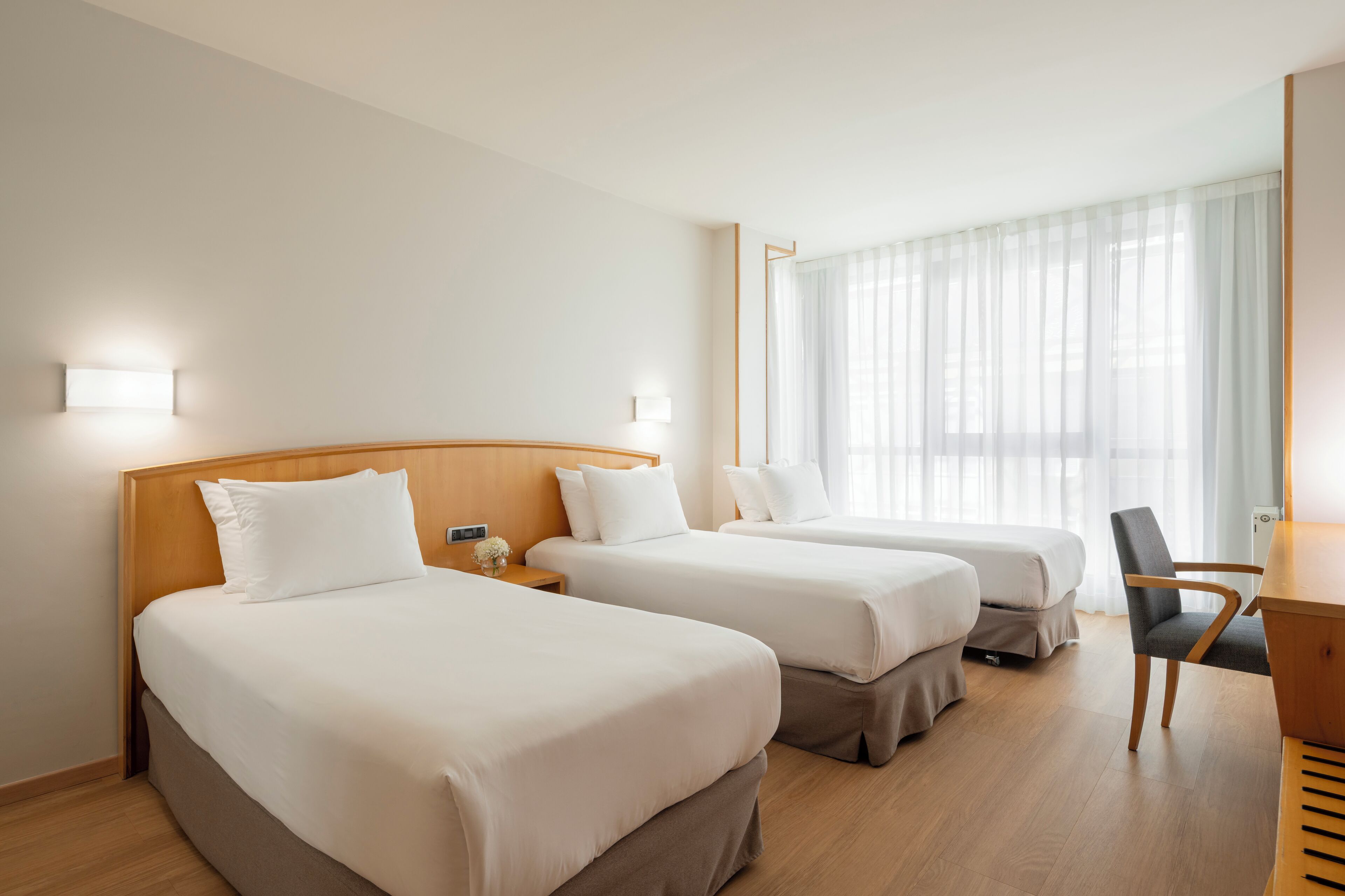 Triple Room | Minibar, desk, blackout curtains, free WiFi