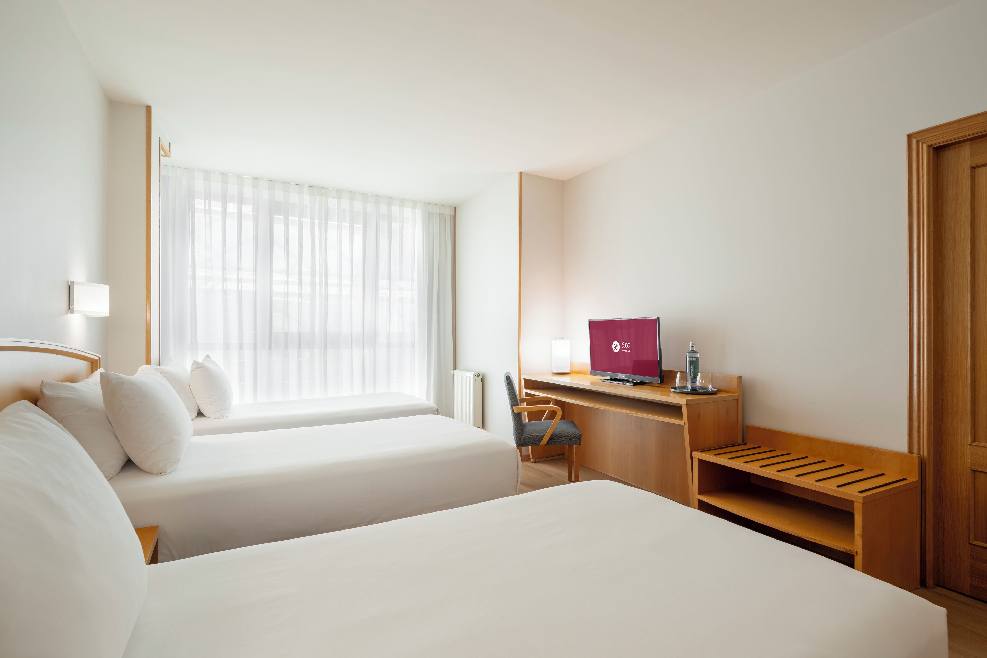 triple room | 1 bedroom, minibar, desk, blackout curtains