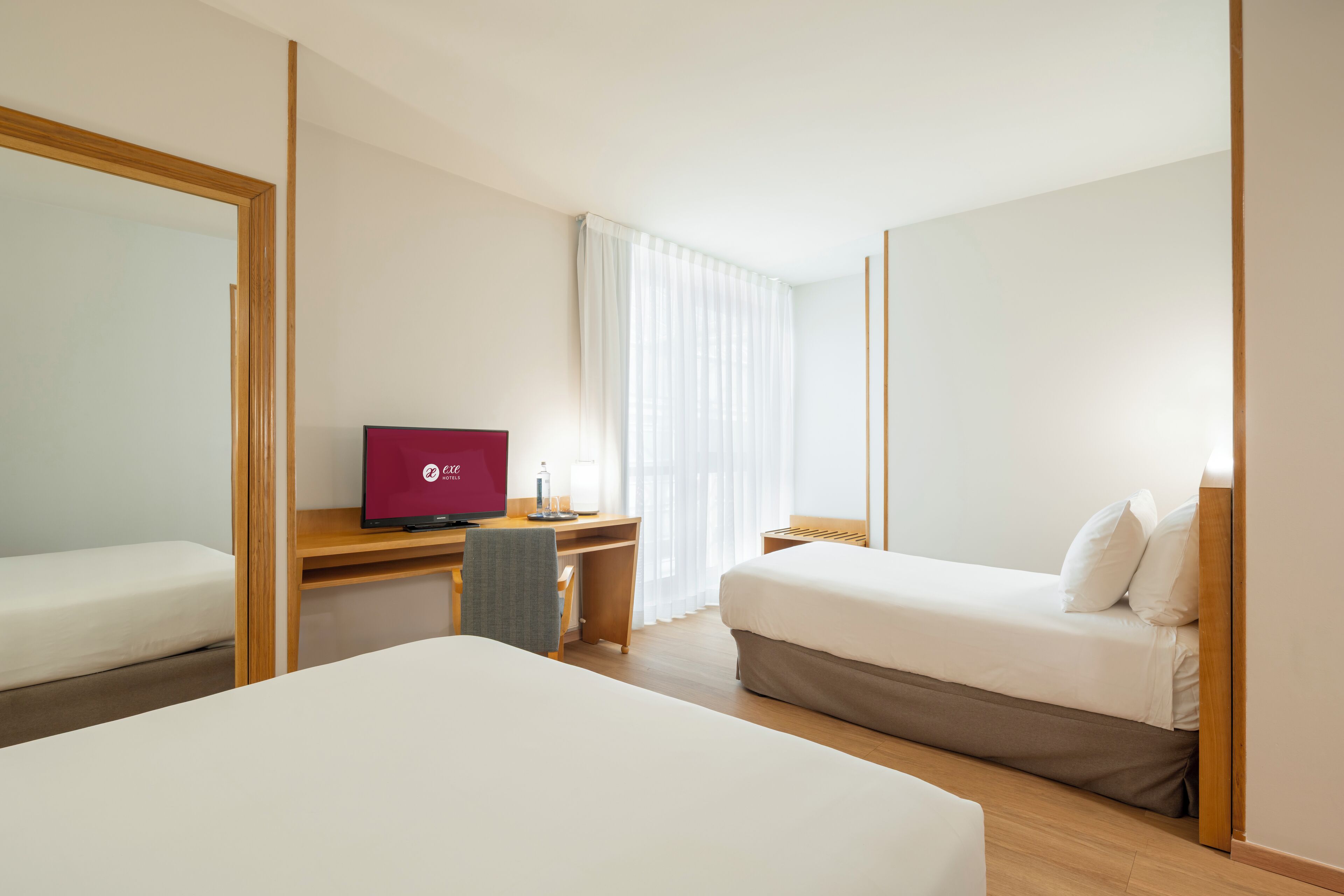 triple room | 1 bedroom, minibar, desk, blackout curtains