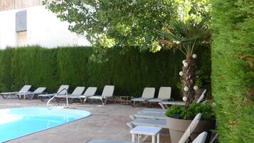 Outdoor pool, sun loungers