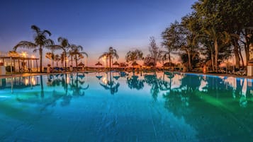 Indoor pool, outdoor pool, pool umbrellas, sun loungers