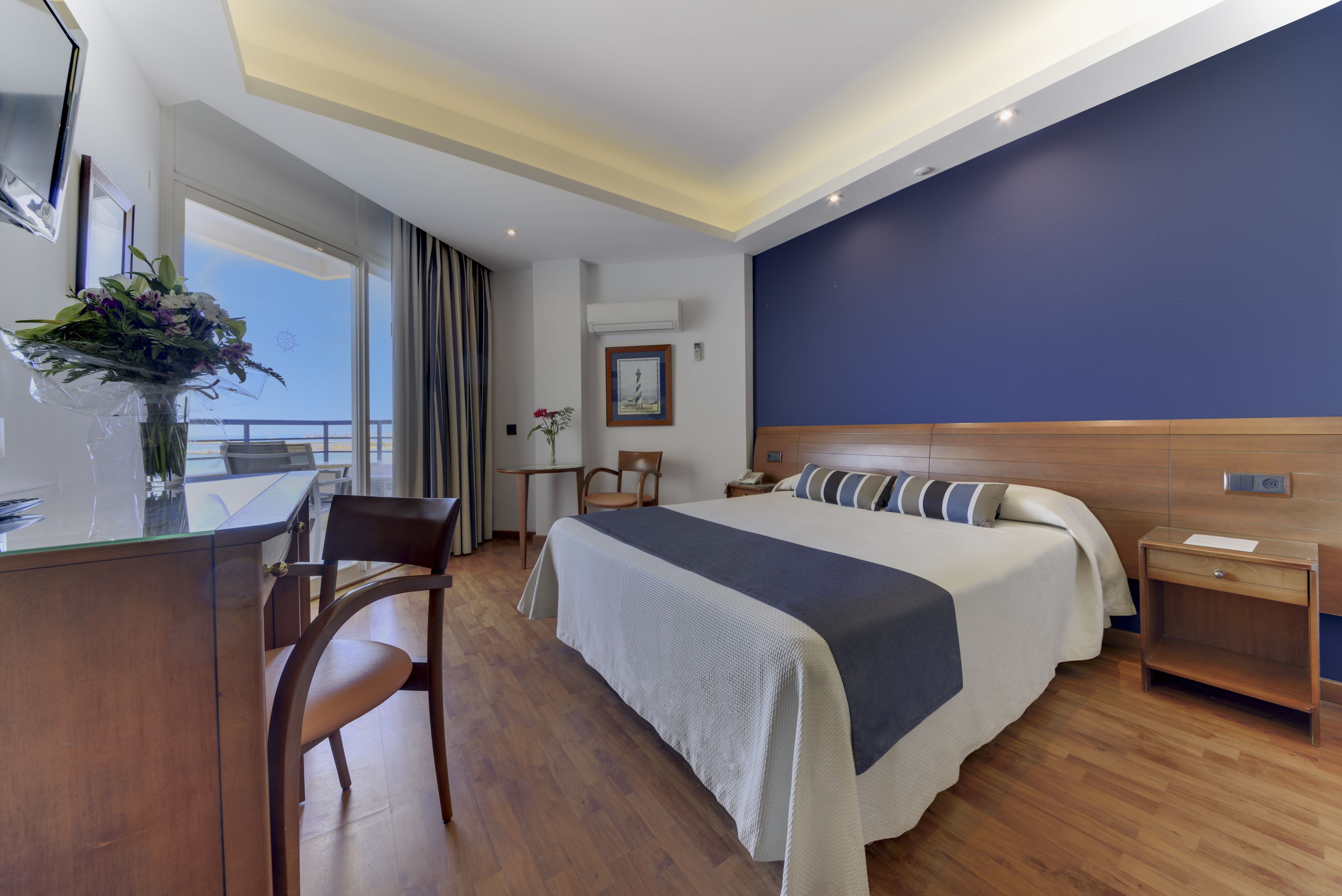 Double or Twin Room, Sea View | Minibar, in-room safe, desk, soundproofing