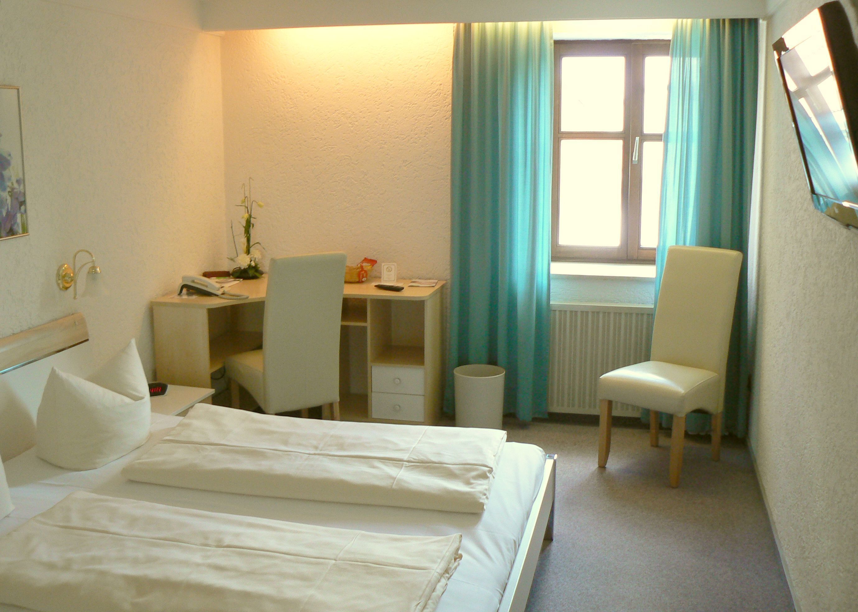 Desk, laptop workspace, blackout curtains, free WiFi