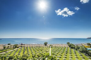 Private beach, beach umbrellas, beach volleyball
