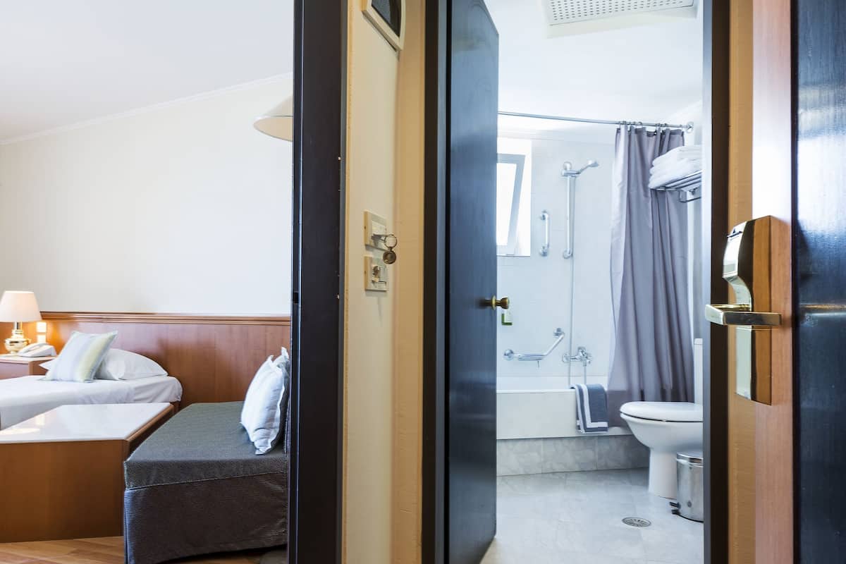 double room, partial sea view | premium bedding, in-room safe, blackout curtains, iron/ironing board