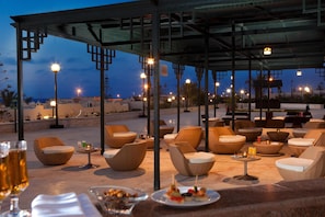 Breakfast, lunch, dinner served; international cuisine, pool views