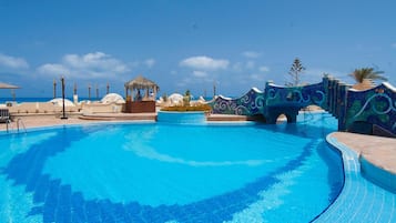 2 outdoor pools, pool umbrellas, pool loungers