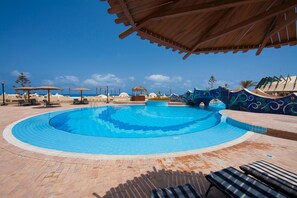 2 outdoor pools, pool umbrellas, pool loungers