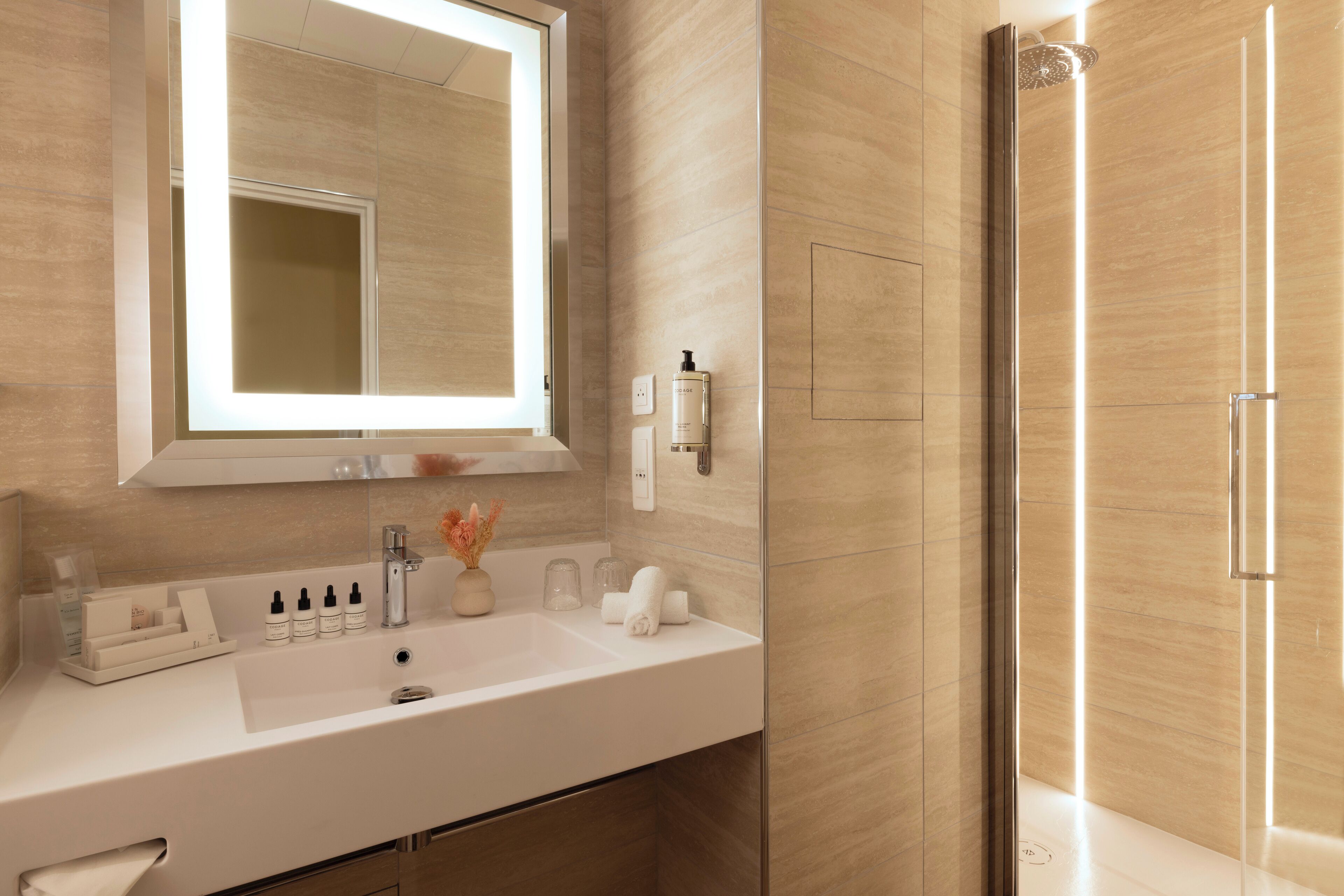 shower, free toiletries, hair dryer, slippers