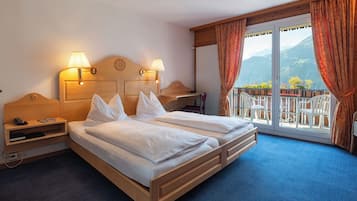 Twin Room, Balcony, Mountain View | In-room safe, desk, free cots/infant beds, rollaway beds