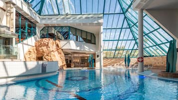 Indoor pool, outdoor pool, pool umbrellas, pool loungers