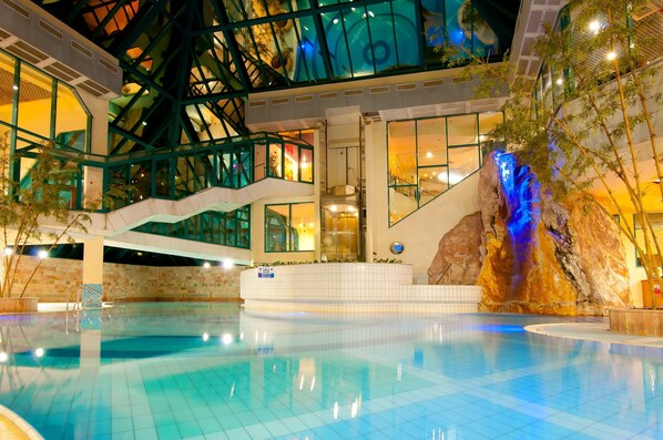 Indoor pool, outdoor pool, pool umbrellas, pool loungers
