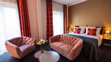 Deluxe Double Room | Minibar, in-room safe, individually decorated, individually furnished