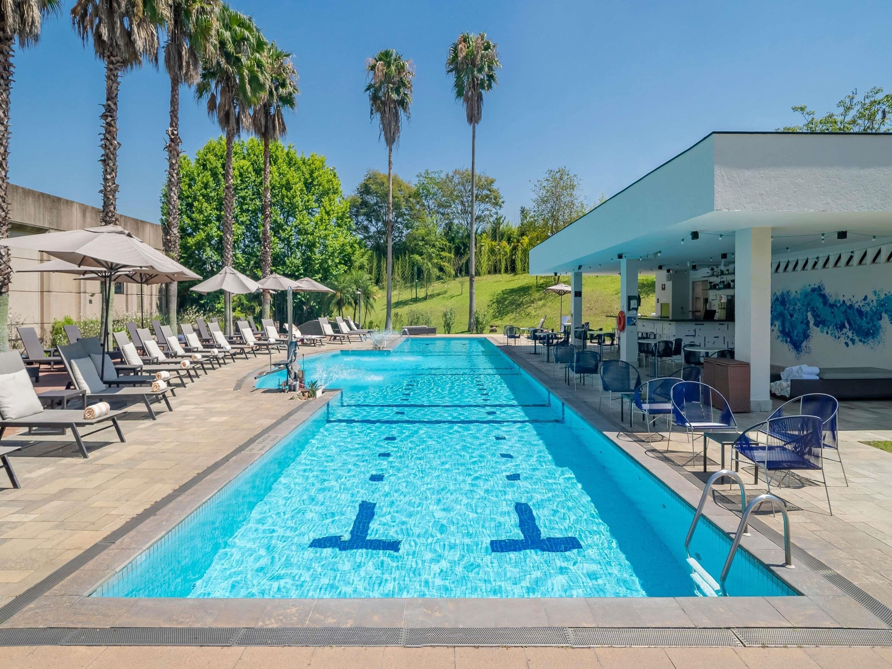 Outdoor pool, pool umbrellas, pool loungers