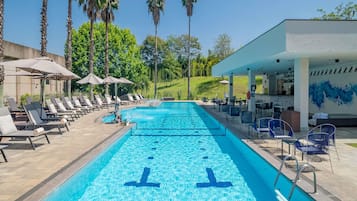 Outdoor pool, pool umbrellas, sun loungers