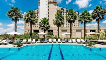 Outdoor pool, pool umbrellas, sun loungers