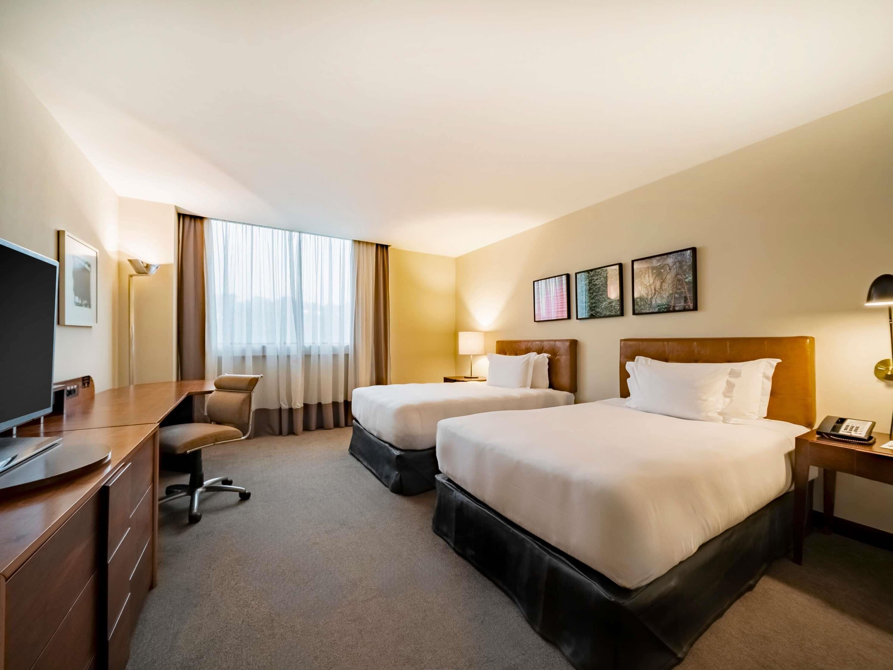 Classic Room, 2 Single Beds | Minibar, in-room safe, desk, laptop workspace
