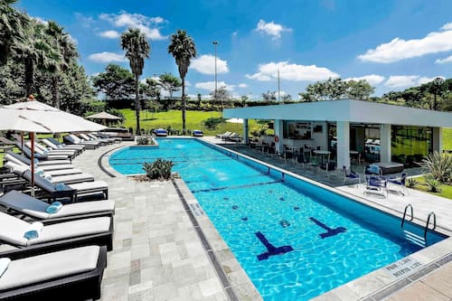 Outdoor pool, pool umbrellas, pool loungers