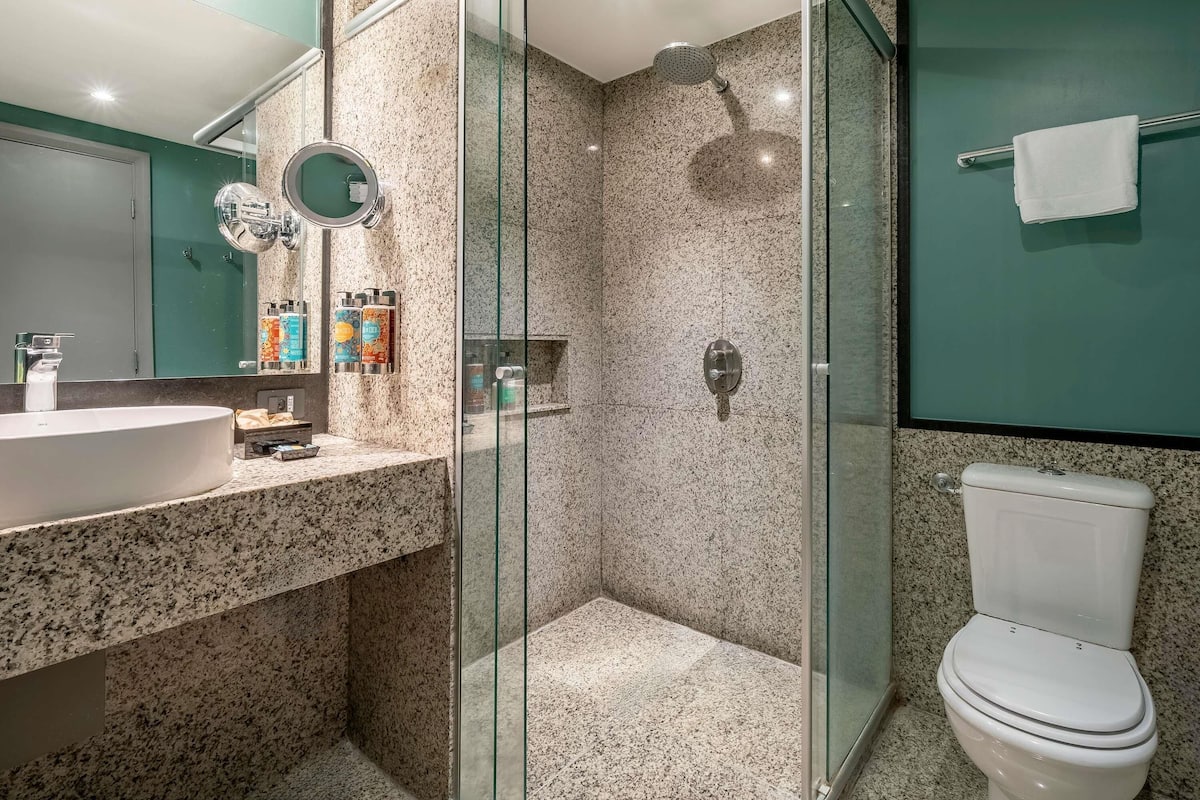 Family Room, 1 King Bed & 1 Single Bed, Bathtub | Bathroom | Eco-friendly toiletries, hair dryer, towels, soap