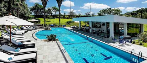 Outdoor pool, pool umbrellas, pool loungers