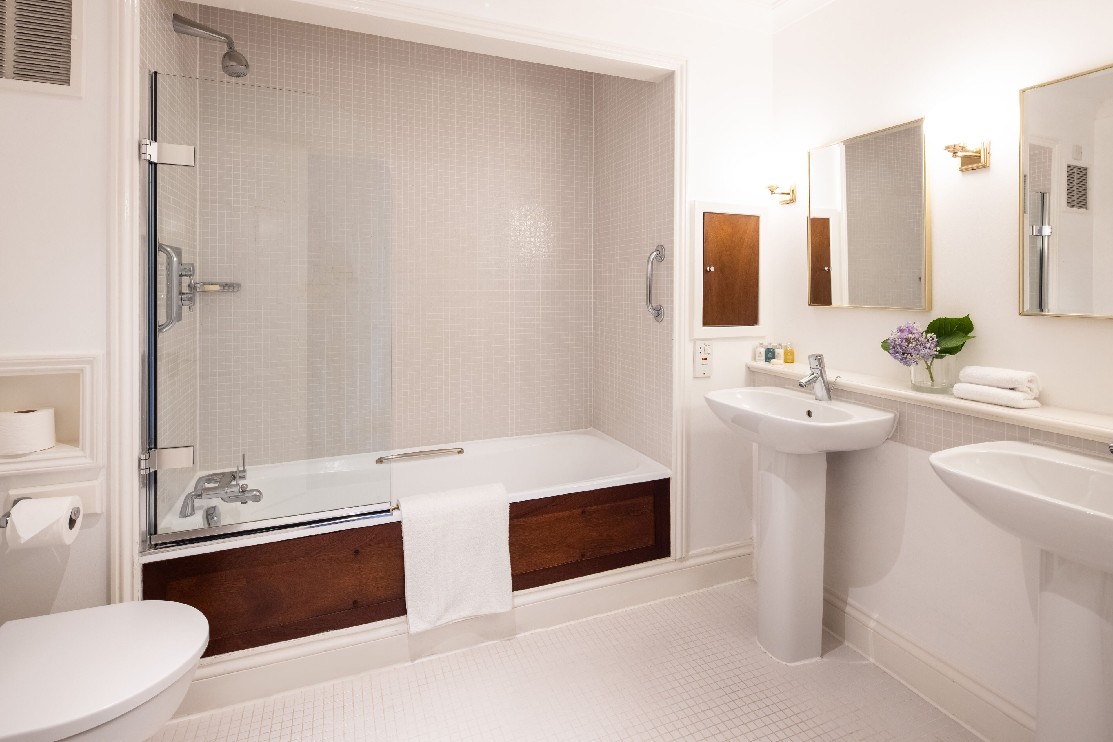 hair dryer, bathrobes, slippers, towels