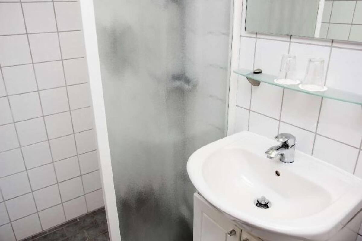 Baño | Regadera y toallas