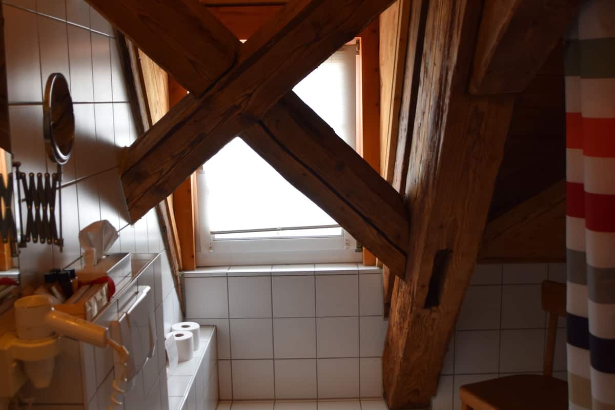 junior suite | bathroom | combined shower/bathtub, hair dryer, bathrobes, slippers