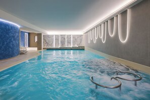 Indoor pool, outdoor pool, pool umbrellas, sun loungers