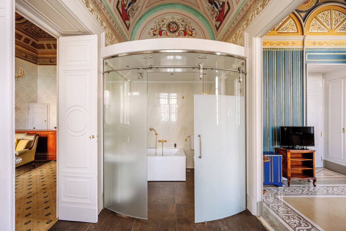 room (w.churchill suite lake view) | bathroom | separate bathtub and shower, free toiletries, hair dryer, bathrobes