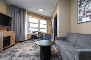 1 bedroom, desk, laptop workspace, bed sheets