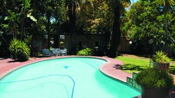 Outdoor pool, pool umbrellas, sun loungers