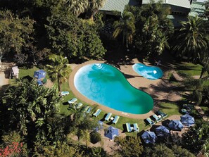 Outdoor pool, pool umbrellas, sun loungers