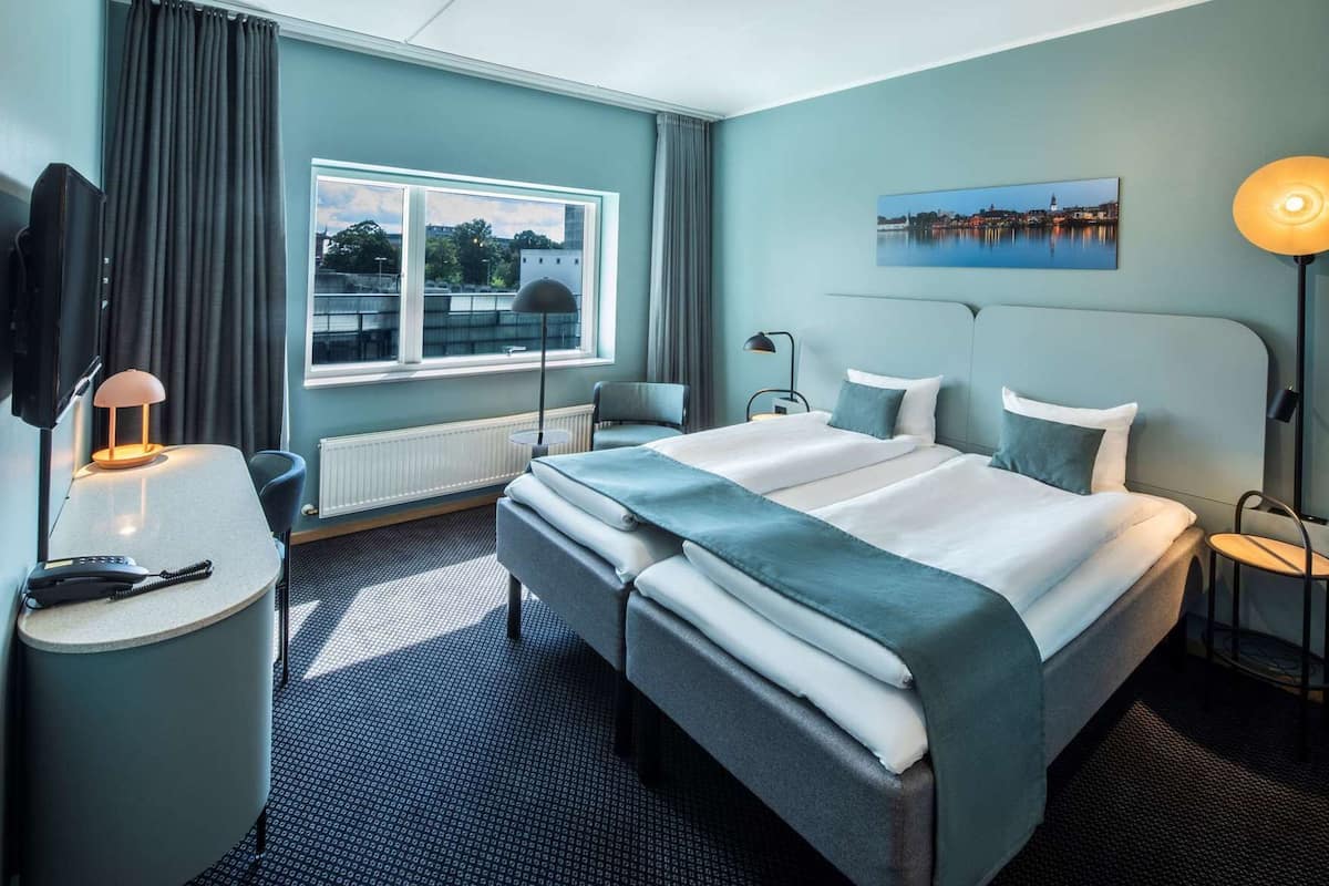 In-room safe, free WiFi, bed sheets, alarm clocks